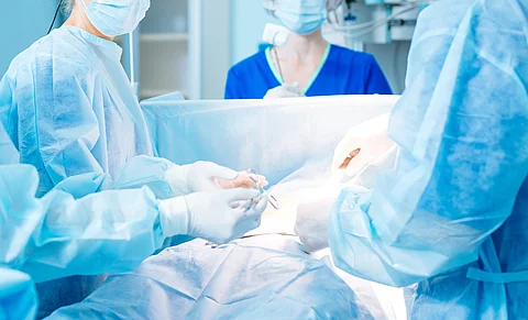 Serious doctor looking at her assistant Serious doctor looking at her assistant