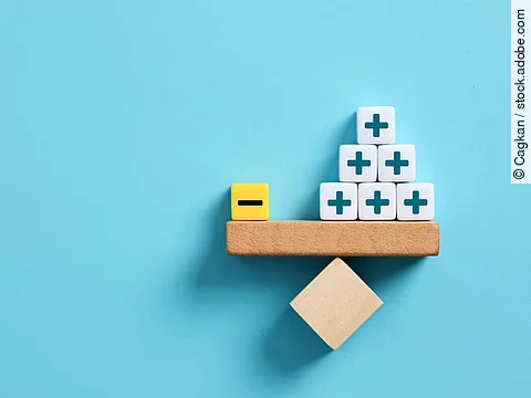 Pros and cons on scales. One negative outweighs many positives. 