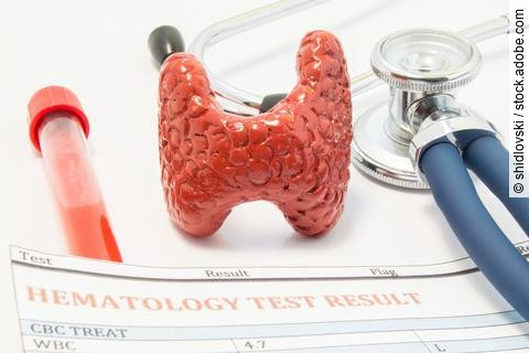 Thyroid-gland-stethoscope-blood-tube-and-hematology-test-result