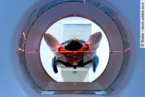 patient entering an MRI machine to produce a detailed and intern