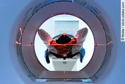 patient entering an MRI machine to produce a detailed and intern patient entering an MRI machine to produce a detailed and intern