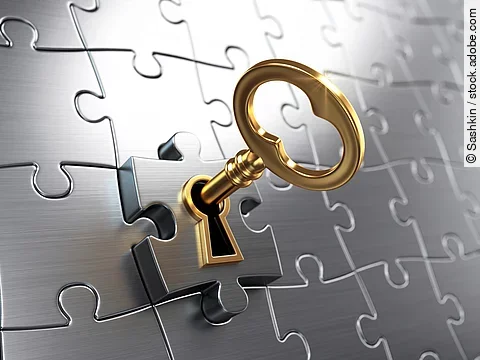 Golden key and puzzle