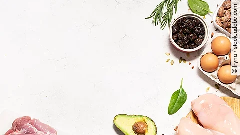 Fresh organic food for low carb keto diet on white marble background long banner format, copy space for your design. Healthy lifestyle and weight loss concept.