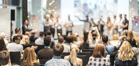 Young business team receiving award at best business project com