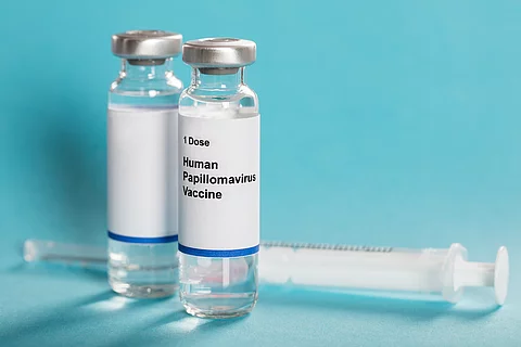 Human Papillomavirus Vaccine In Bottles With Syringe Human Papillomavirus Vaccine In Bottles With Syringe