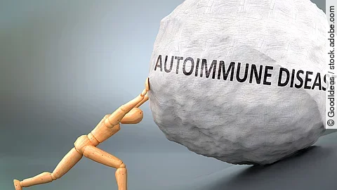 Autoimmunerkrankung - symbolhaft dargestellt als hölzerne Figur, die ein schweres Gewicht schieben muss Autoimmunerkrankung - symbolhaft dargestellt als hölzerne Figur, die ein schweres Gewicht schieben muss