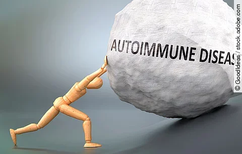 Autoimmunerkrankung - symbolhaft dargestellt als hölzerne Figur, die ein schweres Gewicht schieben muss Autoimmunerkrankung - symbolhaft dargestellt als hölzerne Figur, die ein schweres Gewicht schieben muss