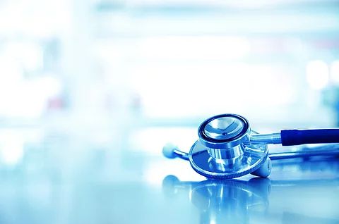 metal stethoscope for doctor diagnosis in blue science laborator