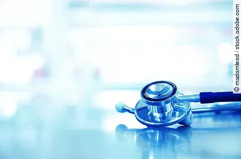 metal stethoscope for doctor diagnosis in blue science laborator