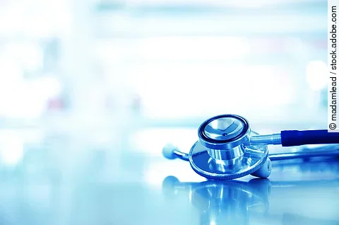 metal stethoscope for doctor diagnosis in blue science laborator