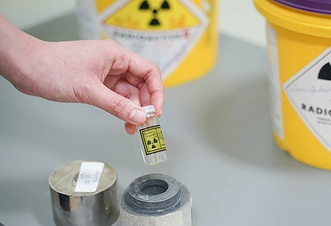 close up hand open lead box of Iodine 131(I-131)Radioactive isotopes used for hyperthyroidism treatment.