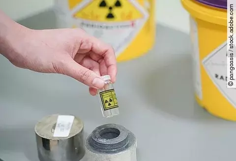 close up hand open lead box of Iodine 131(I-131)Radioactive isotopes used for hyperthyroidism treatment.